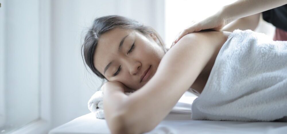 asian woman doing massage