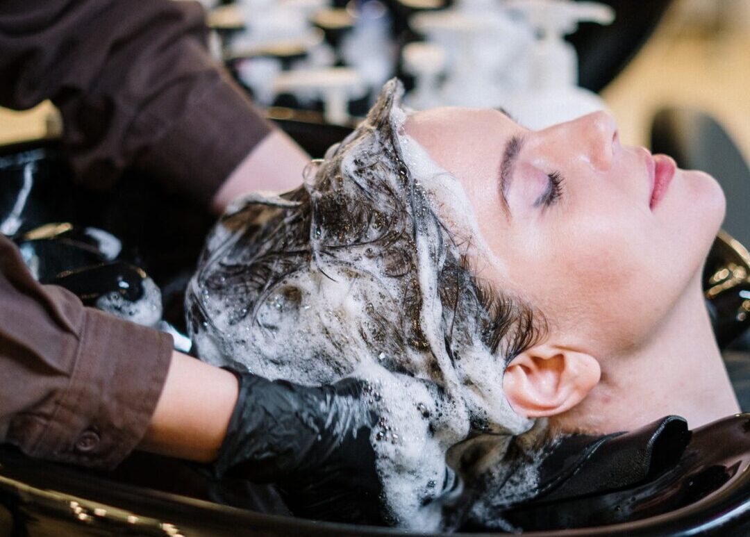 washing hair in a salon