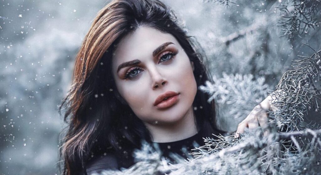 beautiful woman under the snow